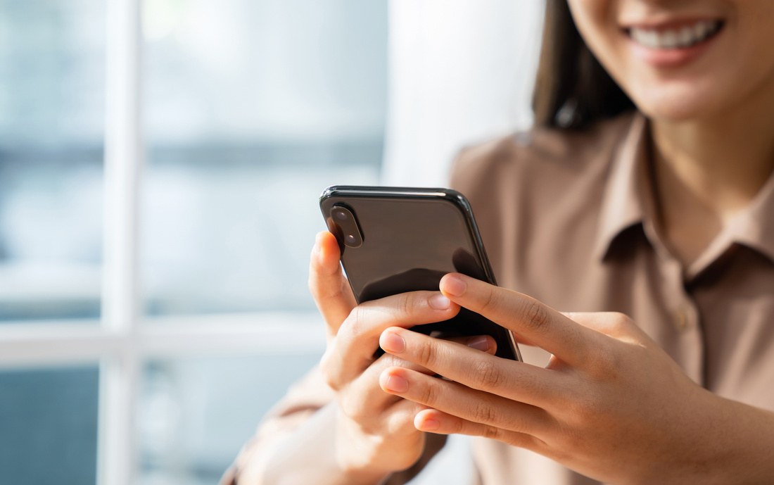 Person making an enquiry on a mobile phone